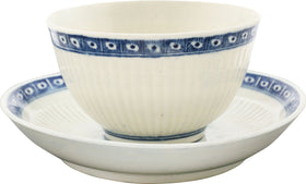 FIRST PERIOD WORCESTER TEA BOWL AND SAUCER. C.1770.