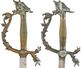 PAIR OF VINTAGE SCIMITAR TYPE SWORDS