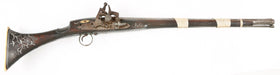 A FINE AND RARE ARAB SNAPHAUNCE JEZAIL CARBINE. C.1859