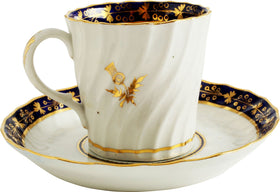 RARE SCOTTISH MOTIF FIRST PERIOD WORCESTER COFFEE CUP AND SAUCER, C.1770